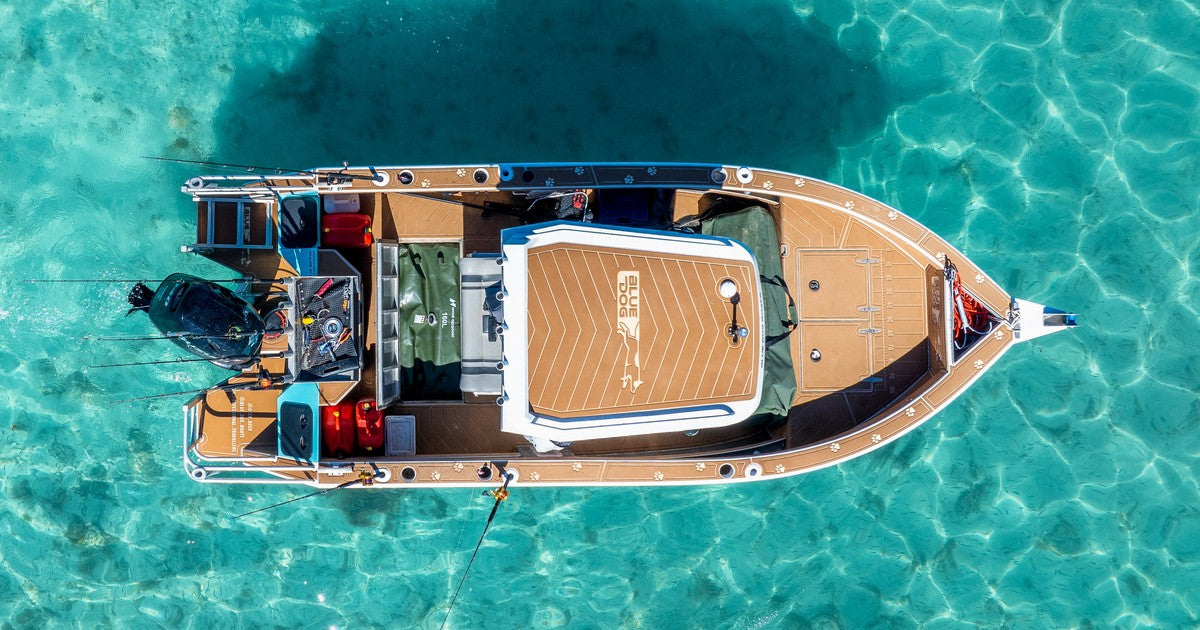 Boat travelling offshore with a Niche Outdoors fuel bladder stored securely on board