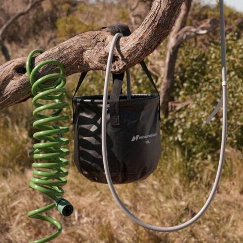 Niche Outdoors Collapsible 10L Water Bucket Hanging from tree